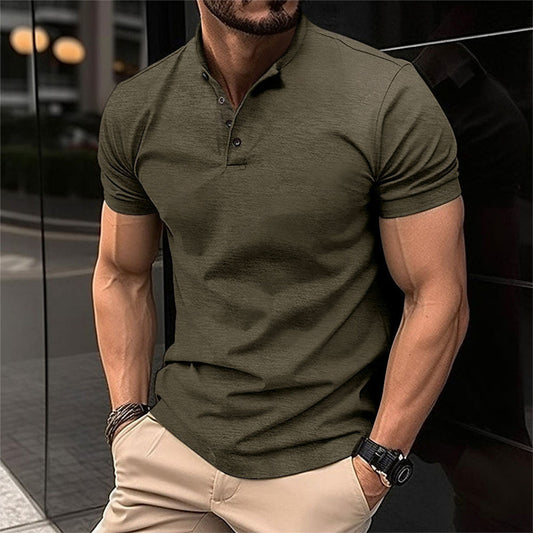 Men's casual polo shirt with a modern fit, short sleeves, and a sleek buttoned collar, styled with neutral trousers for a polished yet relaxed look.