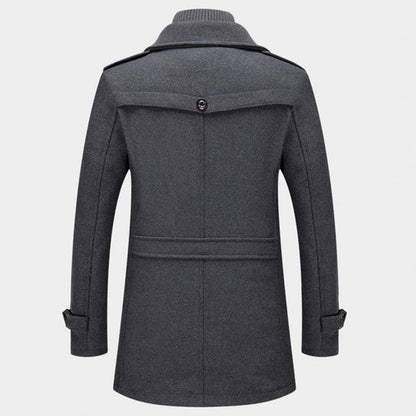 A men's tailored overcoat featuring a modern design with structured details, a sleek fit, and practical pockets, perfect for formal occasions or adding sophistication to everyday wear.