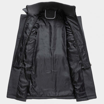 A men's tailored overcoat featuring a modern design with structured details, a sleek fit, and practical pockets, perfect for formal occasions or adding sophistication to everyday wear.