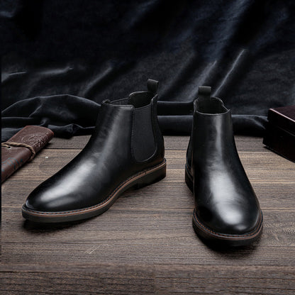 Men's ankle boots with a sleek design and durable construction, featuring a pull-tab and sturdy sole, perfect for versatile everyday wear.