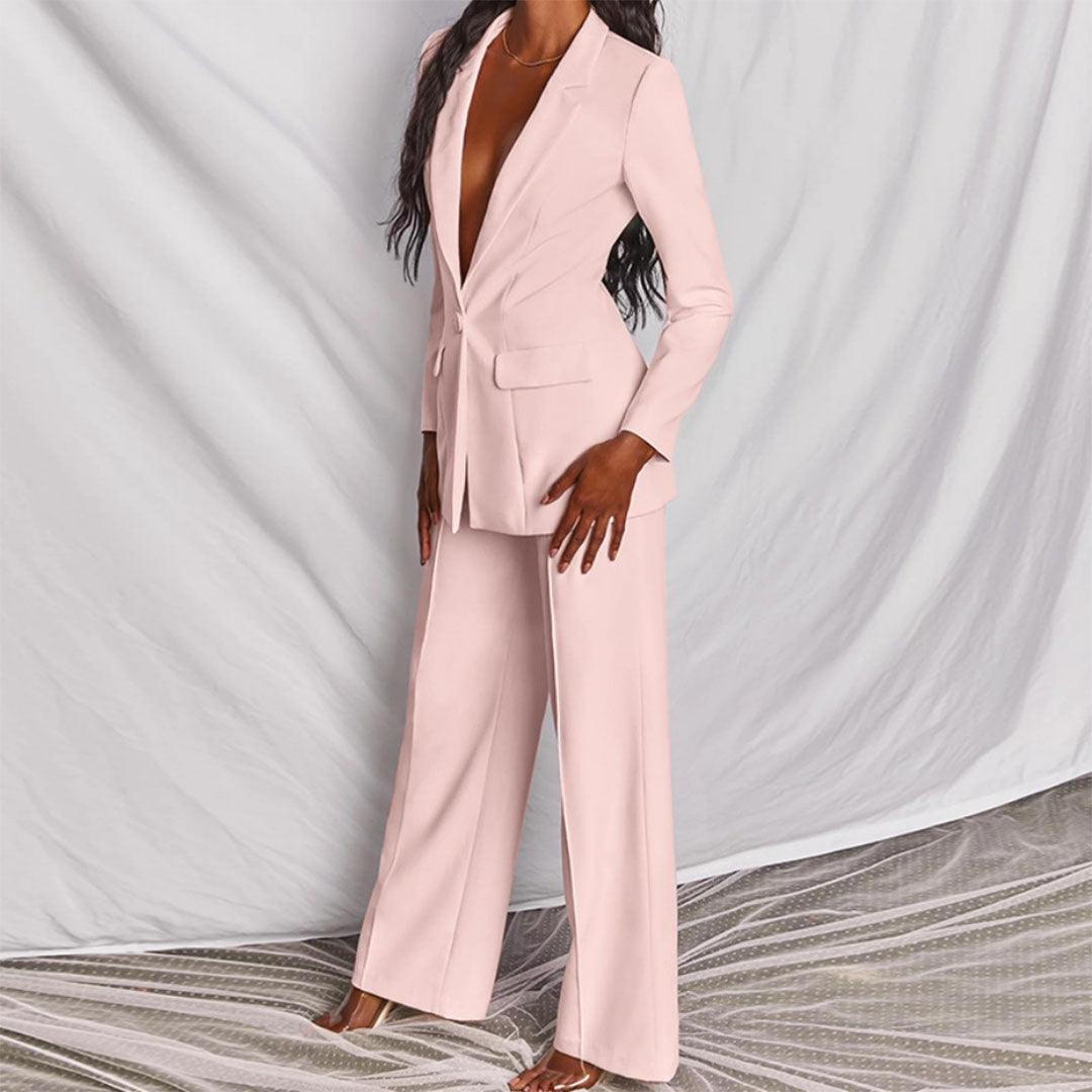 Elegant women's tailored suit set featuring a blazer and matching trousers, designed for a formal and sophisticated look.