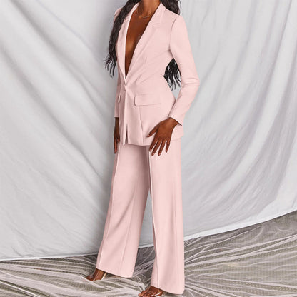 Elegant women's tailored suit set featuring a blazer and matching trousers, designed for a formal and sophisticated look.