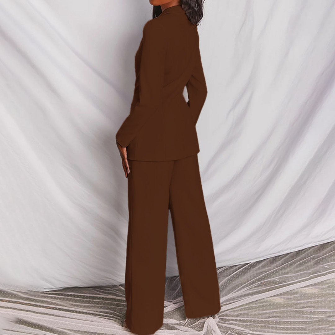 Elegant women's tailored suit set featuring a blazer and matching trousers, designed for a formal and sophisticated look.