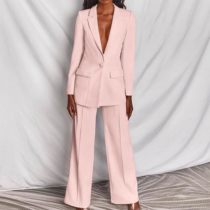 Elegant women's tailored suit set featuring a blazer and matching trousers, designed for a formal and sophisticated look.