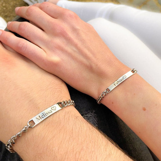 Personalized name bracelets featuring sleek and elegant designs, displayed with customizable name engravings on durable chains.