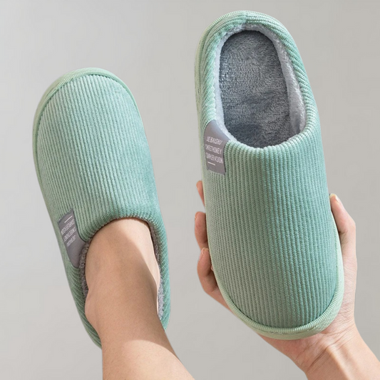 Women's soft slippers with a plush interior and a durable sole, designed for ultimate comfort and everyday wear at home.
