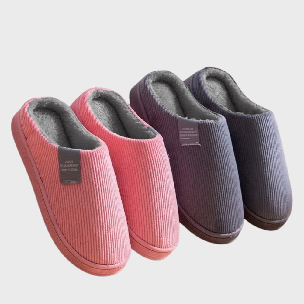 Women's soft slippers with a plush interior and a durable sole, designed for ultimate comfort and everyday wear at home.