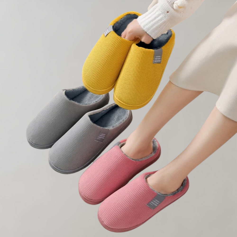 Women's soft slippers with a plush interior and a durable sole, designed for ultimate comfort and everyday wear at home.