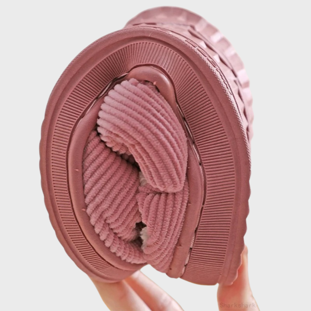 Women's soft slippers with a plush interior and a durable sole, designed for ultimate comfort and everyday wear at home.