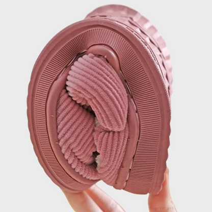 Women's soft slippers with a plush interior and a durable sole, designed for ultimate comfort and everyday wear at home.