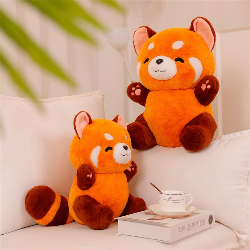 A plush toy featuring an adorable animal design, shown in two sizes, with a soft, huggable texture. Perfect as a cuddly companion for kids or a thoughtful gift for any occasion.