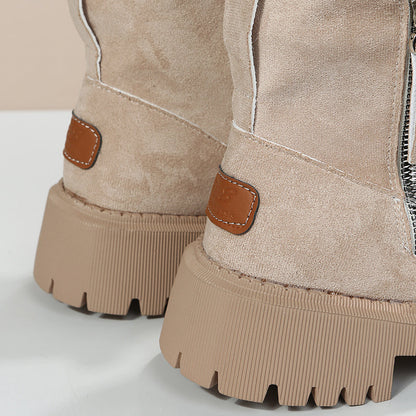 A pair of women's cozy winter boots featuring a soft lining, durable design, and a convenient side zipper for easy wear, perfect for keeping feet warm and stylish during the colder months.