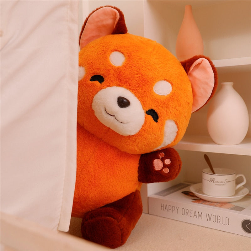 A plush toy featuring an adorable animal design, shown in two sizes, with a soft, huggable texture. Perfect as a cuddly companion for kids or a thoughtful gift for any occasion.