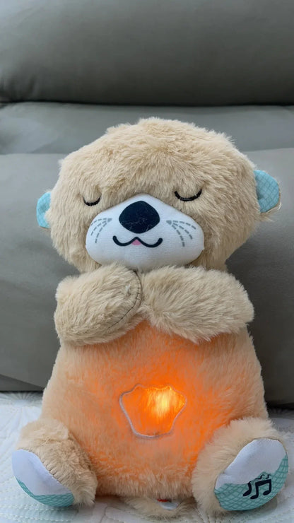 Adorable plush koala toy holding a festive pumpkin with a glowing face, designed to add charm and warmth to any holiday or celebration setting.