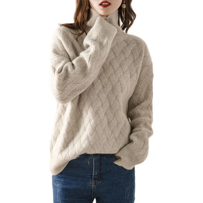 Close-up of a cozy textured knit sweater with a turtleneck design, highlighting the intricate pattern and soft material, perfect for a stylish and warm look.