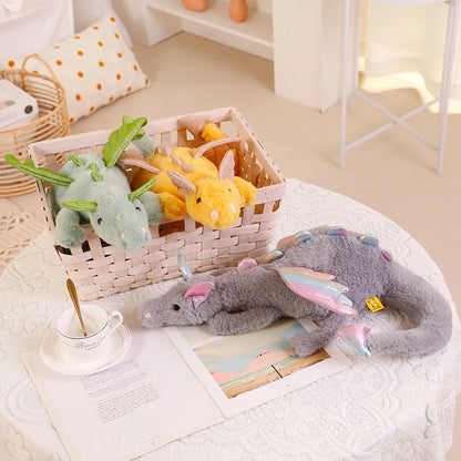 A plush dragon toy featuring a whimsical design with detailed wings and a soft, huggable texture, perfect for playtime, snuggles, or as a unique gift for all ages.