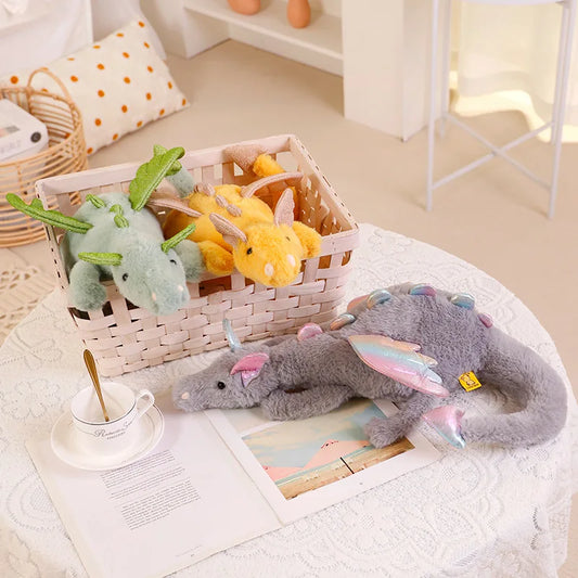 A plush dragon toy featuring a whimsical design with detailed wings and a soft, huggable texture, perfect for playtime, snuggles, or as a unique gift for all ages.