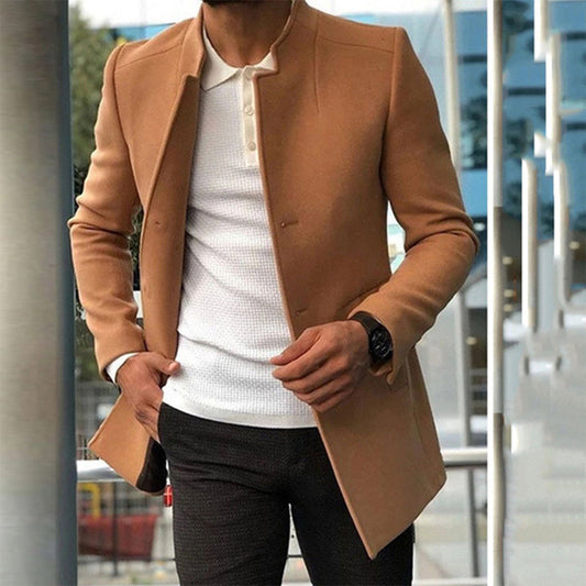 Men's tailored coat with a sleek and sophisticated design, styled over a casual shirt and trousers, perfect for formal or smart-casual occasions.