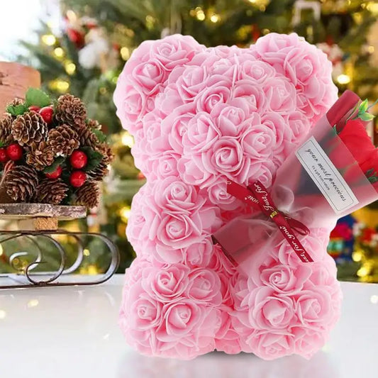 A decorative flower bear crafted from intricate faux roses, presented with an elegant bouquet and housed in a stylish gift box, perfect for special occasions or as a timeless keepsake.