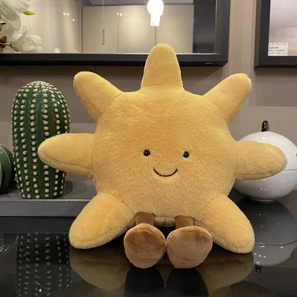 A plush set featuring a cheerful sun and a crescent moon with adorable smiling faces and soft, huggable designs, perfect for snuggles, room decor, or gifting.