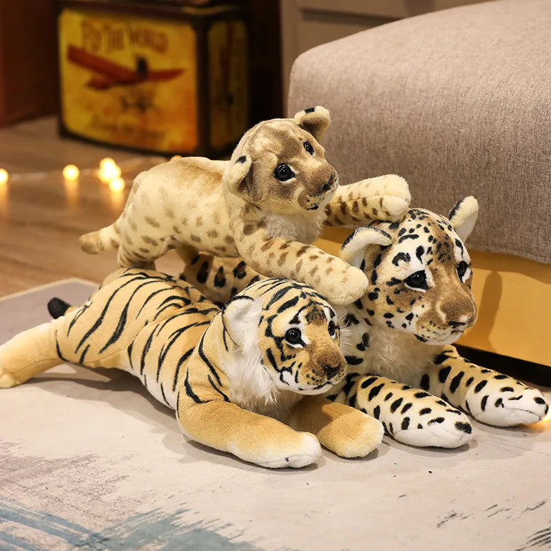 Three adorable plush animal toys featuring lifelike designs of wild animals, displayed on a wooden surface. Perfect for play, decor, or as a cuddly companion.