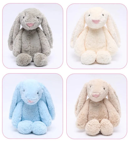 A plush bunny toy with a soft, huggable design and floppy ears, perfect for snuggles, playtime, or as a charming decorative piece for all ages.