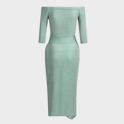 Elegant off-shoulder ruched dress with a stylish slit design, showcasing a sophisticated and flattering silhouette.