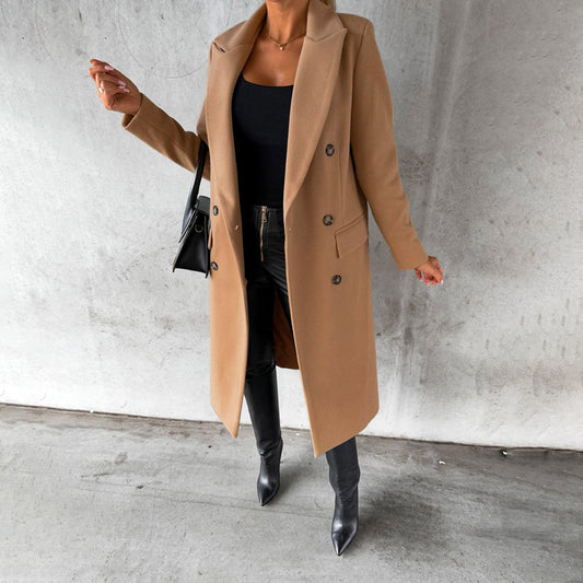 Women's classic long coat featuring a tailored fit, double-breasted buttons, and a chic design, perfect for casual and formal occasions.