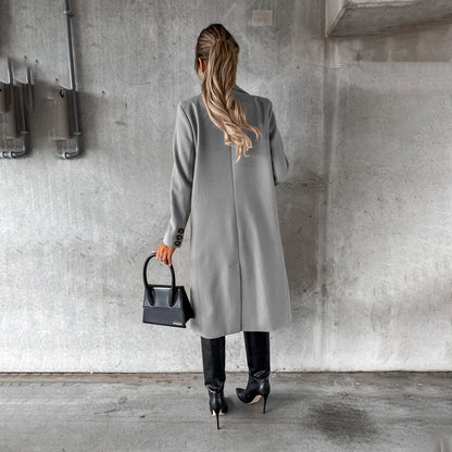 Women's classic long coat featuring a tailored fit, double-breasted buttons, and a chic design, perfect for casual and formal occasions.