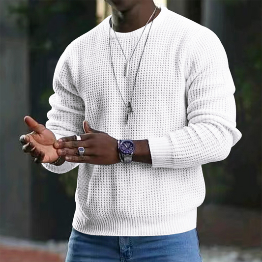 A stylish men's textured sweater featuring a modern design, paired with casual jeans and accessories. Perfect for a sleek and comfortable look suitable for both casual outings and smart occasions.