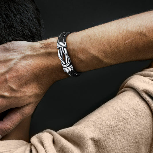 Men's braided rope bracelet with a bold and intricate design, worn on the wrist to showcase its stylish and modern appeal.