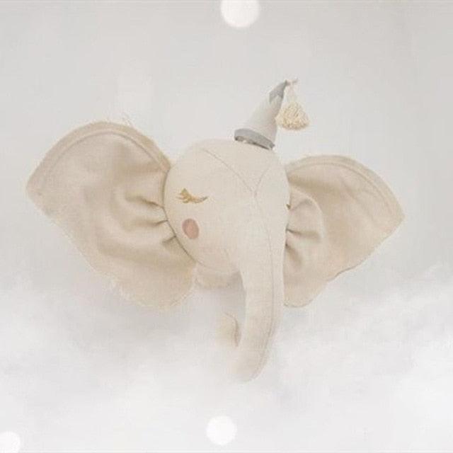 A decorative elephant wall hanging with an elegant design, featuring detailed craftsmanship and a whimsical touch, perfect for nurseries, kids' rooms, or as unique home decor.