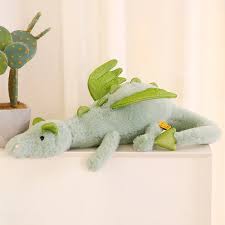 A plush dragon toy featuring a whimsical design with detailed wings and a soft, huggable texture, perfect for playtime, snuggles, or as a unique gift for all ages.