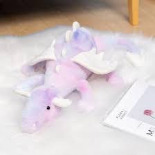 A plush dragon toy featuring a whimsical design with detailed wings and a soft, huggable texture, perfect for playtime, snuggles, or as a unique gift for all ages.